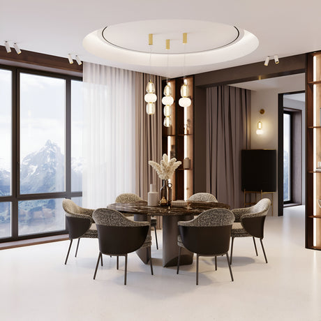 An elegant dining room features a round table with six cushioned chairs, a modern chandelier with gold accents, and a Pattern LED Wall Light in gold. Large windows showcase snow-capped mountains, while neutral tones, sheer curtains, and energy-efficient lighting create coziness.