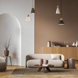 A modern living room showcases a light beige sofa, a round wooden coffee table, and decorative vases. Hanging from the ceiling are Bicones Pendant Lights 22cm in grey with wood detail, perfectly accentuating minimalistic decor on a wooden cabinet against a beige and white wall.
