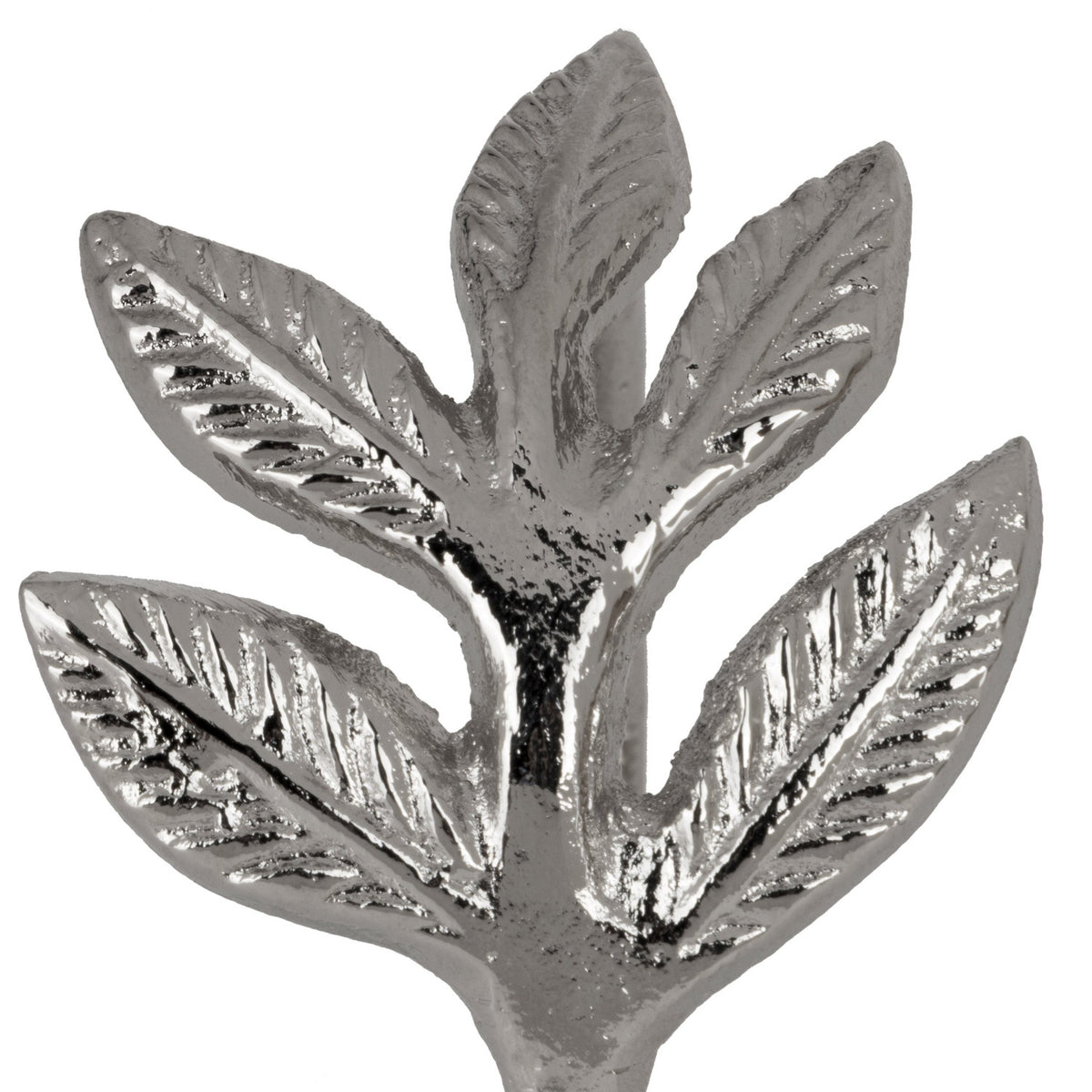 Janapur Napkin Ring in silver aluminium, close-up of the cast leaf sprig with fine veined detailing, shown against a plain white background.