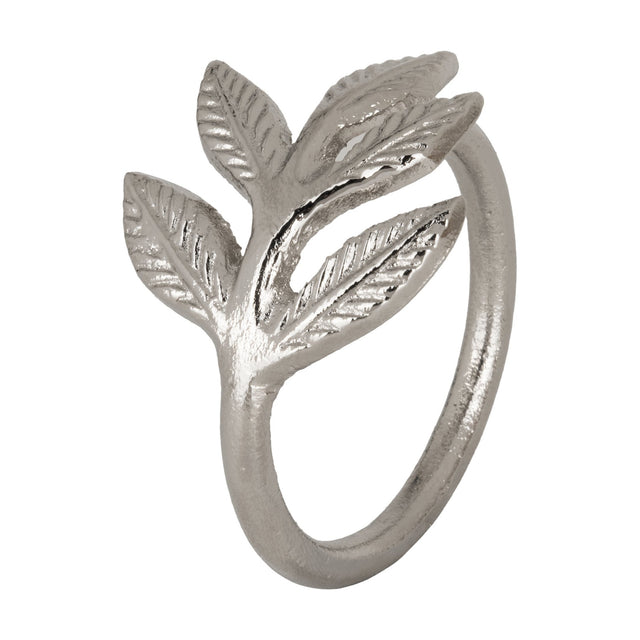 Janapur Napkin Ring in silver aluminium, a round band rising into a cast leaf sprig with veined detailing, shown against a plain white background.