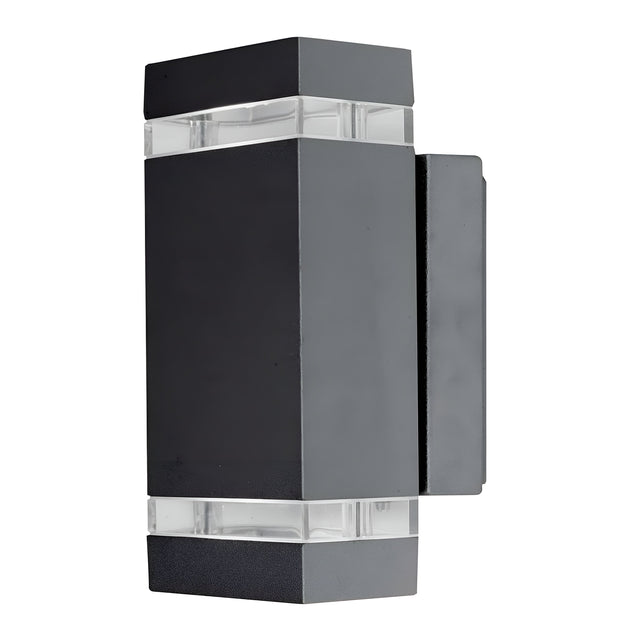 The Jannik 2 Light Outdoor LED Wall Light in graphite features a modern rectangular design with sleek black and transparent sections at the top and bottom for effective area illumination. Its energy-efficient functionality and minimalist aesthetic provide a contemporary enhancement to the decor.