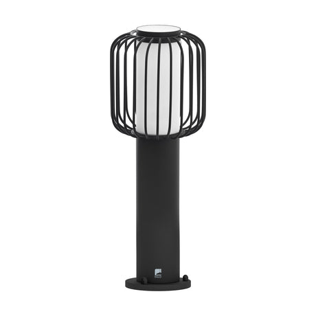 Jerbine Bollard Light in black, a slim post topped with a cylindrical cage of curved bars around a white diffuser, set on a round base plate against a plain white background.