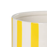 Close-up of the Jinjiti ceramic plant pot in white and yellow, showing the glazed rim and bold vertical stripes on a plain white background.