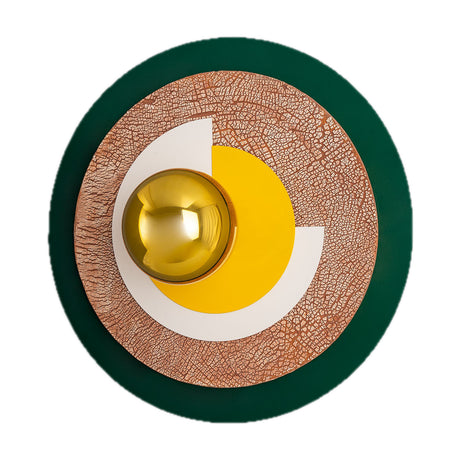 Jupiter Modern Wall Light with layered round discs in terracotta, white and yellow around a polished brass spherical bulb cover, set on a dark green circular backplate.