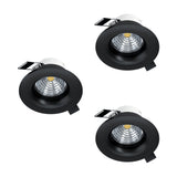 Set of three round Kamarne LED downlights with black aluminium trims and spring clip fittings, shown recessed-style on a plain white background.