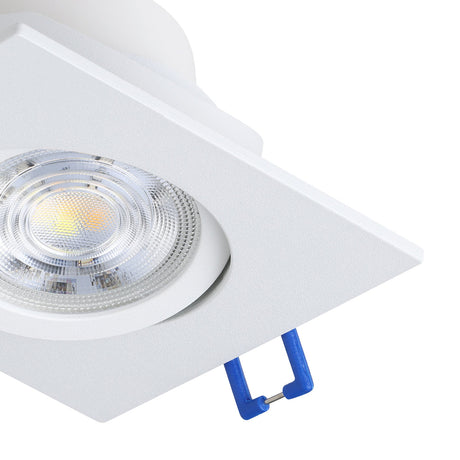 Kamarne square LED downlight in white aluminium, 8.8 x 8.8cm, showing the round tiltable bezel with integrated LED and blue spring clips, on a plain white background.