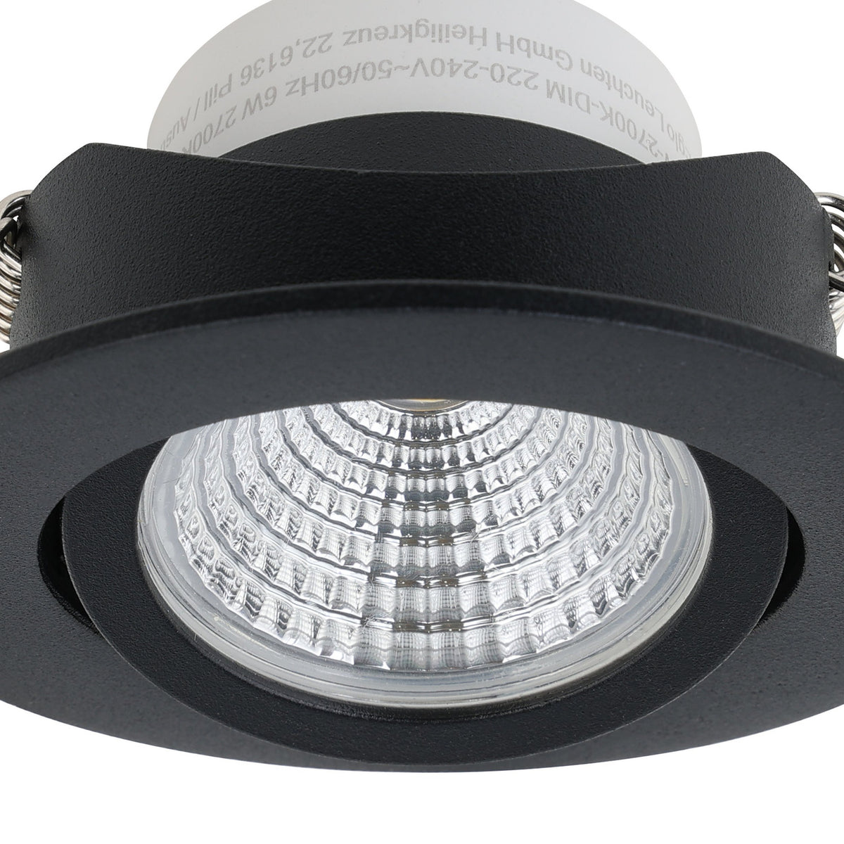 Close-up of the Kamarne LED downlight, round black aluminium bezel with tiltable inner head, 8.8cm, dimmable, warm white 2700K, on a white background.