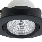 Close-up of the Kamarne LED downlight, round black aluminium bezel with tiltable inner head, 8.8cm, dimmable, warm white 2700K, on a white background.