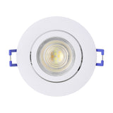 Round white recessed LED downlight with adjustable tilting centre and illuminated warm-white LED module, shown against a plain white background.