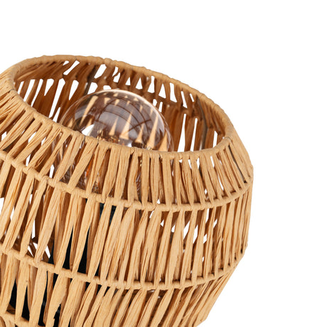 Close-up of the Karmena Table Lamp's woven natural paper shade with visible E27 bulb inside, on a plain white background.