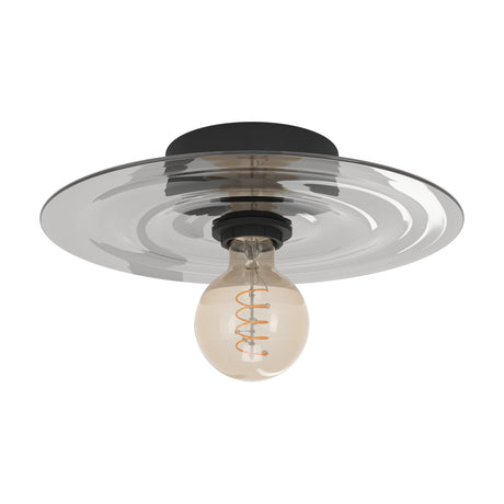 Karnette Wall Light in black and light grey, featuring a wide rippled glass disc on a round black steel base with an exposed E27 globe bulb, shown on a plain white background.