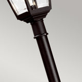 Close-up of the Kerry 1 Light Lamp Post in black, featuring a traditional lantern-style light fixture, designed to be corrosion-proof. The backdrop is a plain, light gray.