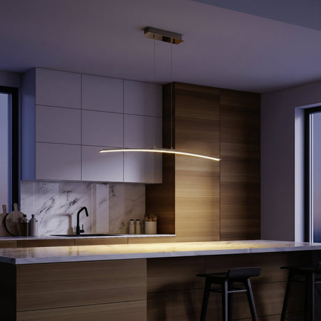 Keselle Pendant Light 30W 90cm in chrome, a slim curved LED bar suspended from a rectangular ceiling canopy above a kitchen island with marble worktop.