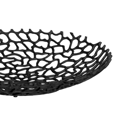 Close-up of the Kimitsu Decorative Bowl 45cm in black aluminium, showing its open lattice of irregular coral-like openings on a plain white background.