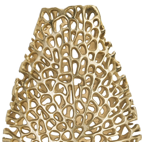 Close-up of the Kimitsu Vase in gold aluminium, showing its openwork coral-like lattice with irregular holes, photographed against a plain white background.