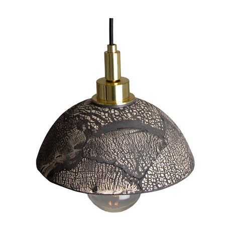 Kingii ceramic pendant light with a dome-shaped Black Clay glazed shade featuring a crackled texture, brass fitting, and exposed globe bulb, shown on a plain white background.