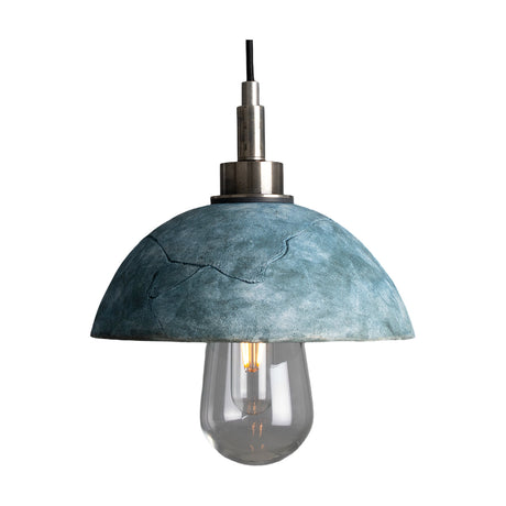 Kingii ceramic pendant light with a rounded dome shade in textured Blue Earth glaze, brass stem and collar, exposed bulb beneath, shown on a plain white background.