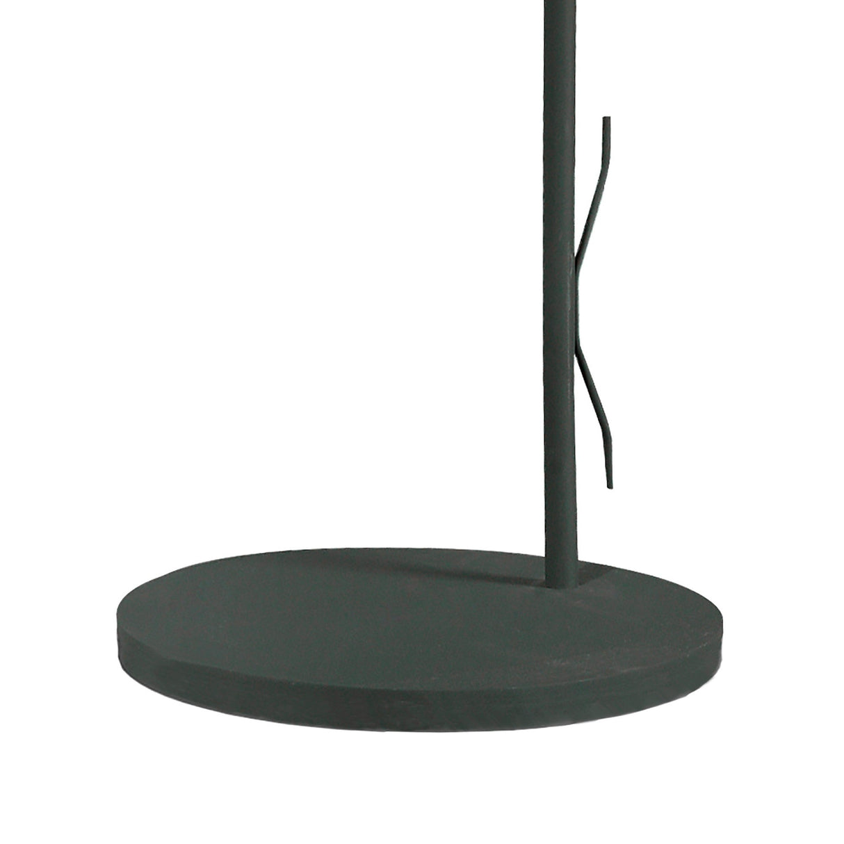 A close-up of the round, flat black base and vertical pole with a thin wire beside it, characteristic of the Kinke Floor Lamp With Hook - Anthracite, an elegant floor lamp created for modern interiors.