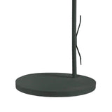 A close-up of the round, flat black base and vertical pole with a thin wire beside it, characteristic of the Kinke Floor Lamp With Hook - Anthracite, an elegant floor lamp created for modern interiors.