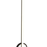 The Kitesurf LED Floor Lamp 24W 3000K in black features a slim vertical light tube on a looped circular base, offering modern minimalist lighting ideal for contemporary spaces.