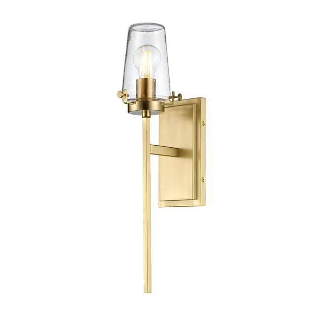 The Alton 1 Light Wall Light in brushed brass showcases a rectangular backplate and vertical arm, with a clear glass shade that reveals the light bulb. Its elegant and minimalist design is ideal for adding industrial-era charm to your bathroom decor.