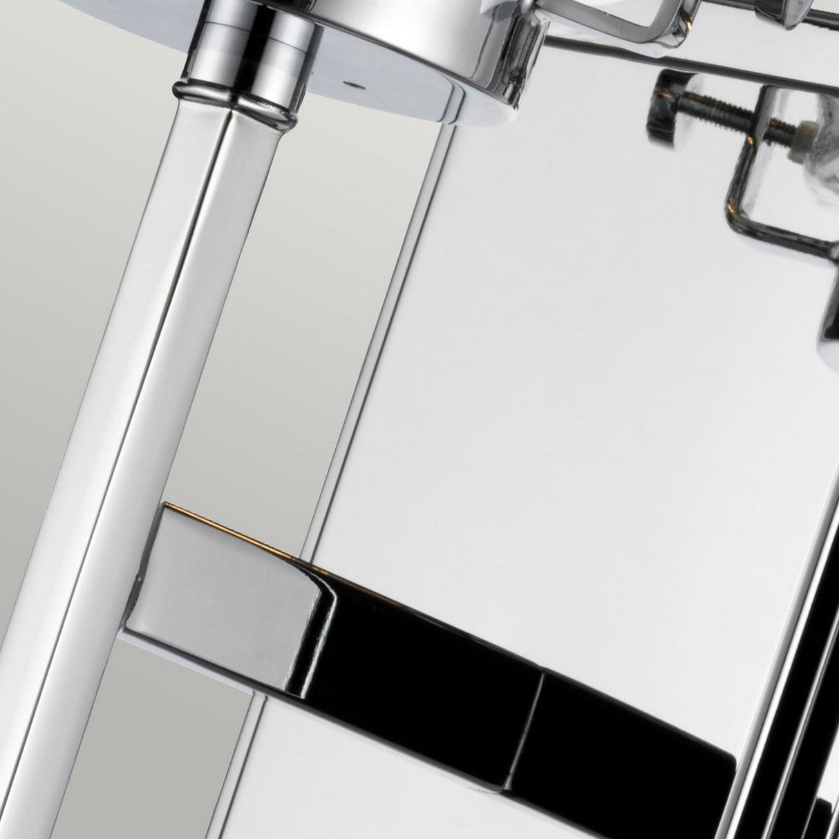 Here's a revision based on the provided product data:

Close-up of a modern stainless steel French press coffee maker, mirroring the polished aesthetic of the Alton 1 Light Wall Light in chrome, with sleek, reflective surfaces. The image highlights the handle and top part against a light background, capturing the elegant simplicity common in contemporary design elements.