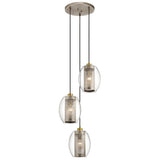 The Asher 3 Light Pendant - Silver exudes a modern industrial-inspired aesthetic, featuring three cylindrical mesh lampshades that are suspended at varying heights. Each lampshade is encased in an oval glass casing and hangs from black cords attached to a circular ceiling mount. The silver finish provides an elegant touch.