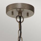 Close-up of the Ashland Bay Outdoor 1 Light Small Chain Lantern, showcasing a circular metal canopy with a rustic burnished bronze finish. The chain links hang elegantly from the canopy, attached to a sleek black cord, set against a light gray background.