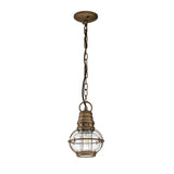 The Bridgepoint Outdoor 1 Light Small Chain Lantern in Natural Brass showcases a nautical design with a clear seeded glass shade and metal cage. Suspended by a chain-linked rod, it embodies a vintage aesthetic reminiscent of an outdoor lantern.