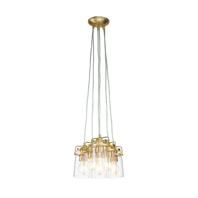 The Brinley 6 Light Pendant in brushed brass features a modern design that includes six clear glass shades, each suspended by multiple cords, showcasing light bulbs against a white background. Its elegant style flawlessly merges contemporary and industrial elements, evoking the essence of mid-century modern lighting.