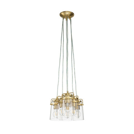 The Brinley 6 Light Pendant in brushed brass showcases a sleek, mid-century modern design with its clear glass shades, each encasing an exposed bulb. The fixture elegantly hangs from a circular base, suspended on multiple long cords for a minimalist look.