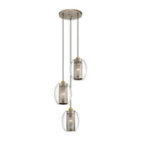 A contemporary pendant light fixture with three individual lights, each enclosed in an oval-shaped clear glass cover and showcasing a textured cylindrical metallic interior with an antique pewter finish. This adaptable lighting option is connected by cords to the Ceiling Pan Round Ceiling Plate - Silver.