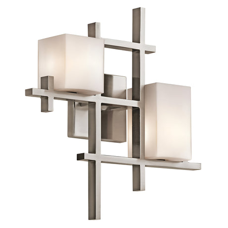 Introducing the City Lights 2 Light Wall Light in Silver, a contemporary fixture with a geometric metal frame of intersecting lines. It holds two frosted cube-shaped light shades and features sleek metallic finishes and modern LED technology for soft, diffused lighting.