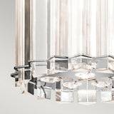 A close-up of the Crystal Skye 2 Light Mini Pendant in chrome showcases its modern design, featuring angular, prism-like pieces that beautifully reflect light. The chrome accents emphasize its geometric style against a soft gray background, while the transparent crystal prisms bring an elegant touch to this mini pendant piece.