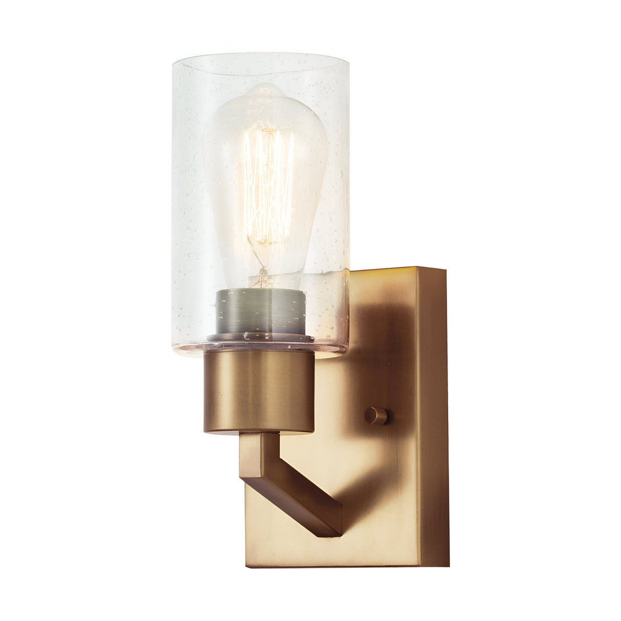 The Deryn 1 Light Wall Light in Natural Brass boasts a clear seeded glass shade and a visible filament bulb, mounted on a rectangular natural brass backplate with a short arm. When illuminated, it casts an elegant glow ideal for rustic decor.