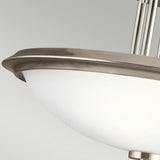 Close-up of the Dreyfus 3 Light Semi Flush - Silver ceiling light fixture showcasing a frosted glass bowl and sleek metal rim. This minimalist design radiates modern elegance with its smooth lines and contemporary aesthetic set against a neutral gray background.