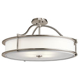 Introducing the Emory 4 Light Duo-Mount Chandelier in Silver, a contemporary ceiling light fixture featuring a round brushed metal frame with a silver finish and white frosted glass. This semi-flush chandelier combines clean, modern lines with sleek metal detailing for an elegant appearance.