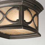 Here’s a revised version using the product data:

A close-up of the Franceasi Outdoor 2 Light Flush, showcasing its octagonal design with an Olde Bronze frame adorned with intricate patterns. Its frosted glass panels, accented by some amber-tinted sections, elegantly diffuse the light.
