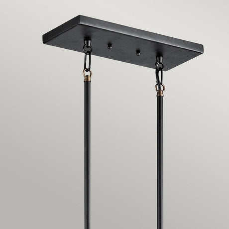 The Imahn 5 Light Bar Pendant in Black & Natural Brass features a minimalistic rectangular ceiling mount with two sturdy rods extending downward, showcasing an industrial-inspired design. The pendant includes metal hooks and hardware set against a light gray background, making it perfect for displaying Edison-style LED bulbs.