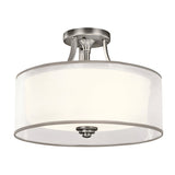 Product Description: The Lacey 3 Light Small Semi Flush – Silver is a ceiling-mounted contemporary light fixture featuring a frosted glass drum shade with metallic accents and a circular design. It emits a layered glow and comes with a polished silver finish.