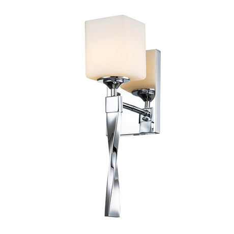 The Marette 1 Light Wall Light features a polished chrome finish and a white square frosted glass shade. Its design showcases a sleek, twisted metal arm connecting the base to the opal glass shade, offering a contemporary aesthetic.