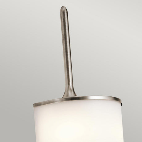 Introducing the Mona 2 Light Large Wall Light - Silver, a modern fixture that boasts a cylindrical white shade and a sleek metal rod with an elegant silver finish extending upward. Its minimalist, mid-century-inspired design complements any neutral background beautifully.