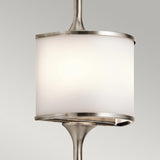 The Mona 2 Light Large Wall Light - Silver showcases a modern pendant light design with mid-century-inspired elements, featuring a cylindrical white frosted shade and sleek metallic frame. Its elegant silver finish stands out beautifully against a light gray background.