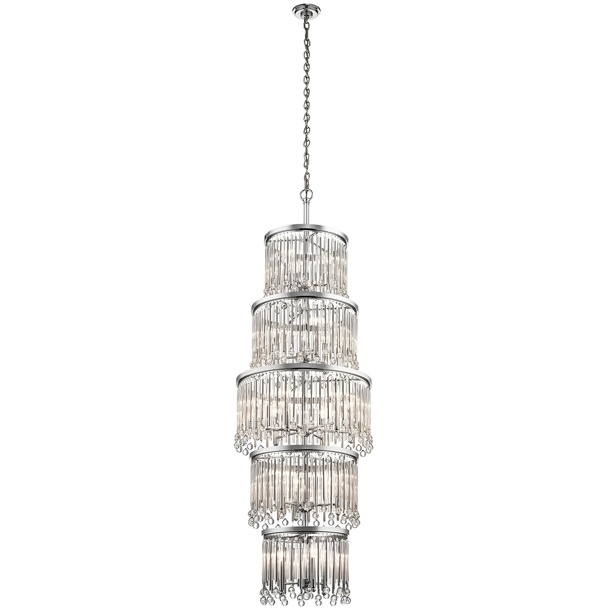 The Piper 18 Light Chandelier - Polished Chrome is a tall, elegant fixture featuring multiple tiers of hanging crystal tubes suspended from a polished chrome chain. Its design creates a cascading effect, reflecting light beautifully and adding a touch of luxury. Glass bead accents further enhance the frame's sophisticated appearance.