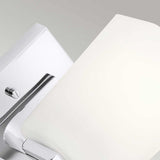 Close-up of the Roehm 1 Light Wall Light in polished chrome, featuring an opal glass shade, mounted elegantly against a light gray background. The fixture's sleek design and subtle curves convey a minimalist aesthetic while being IP44 rated for added durability.