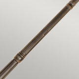 Close-up of the Tournai 3 Light Extra Large Lamp Post in bronze, featuring decorative grooves and smooth bands, radiating vintage charm against a light gray background.