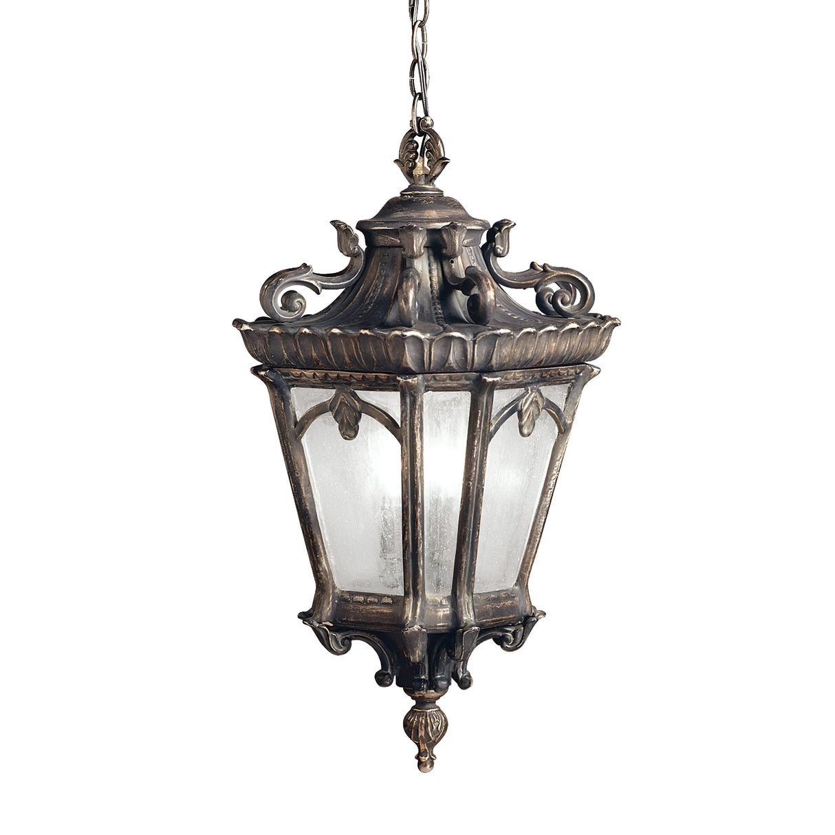 The Tournai Outdoor 4 Light Grand Extra Large Chain Pendant in Bronze boasts a vintage design with intricate metalwork and frosted glass panels. Suspended by a chain, this outdoor pendant features a decorative top, ornate details, and a classic, weathered finish that lends timeless elegance to any space.