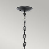 A close-up of the Vandalia Outdoor 3 Light Large Chain Pendant in black, featuring its sleek modern lantern design against a neutral gray background.