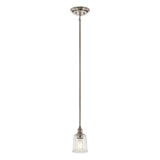 The Waverly 1 Light Mini Pendant in silver boasts a single, modern design that hangs from the ceiling. It showcases a clear glass shade and a visible bulb, providing a minimalist yet elegant look ideal for those who appreciate vintage style.