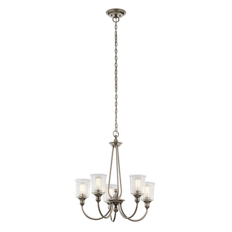The Waverly 5 Light Chandelier - Silver features a timeless design with five lights gracefully suspended from a long chain. Its silver metal body elegantly supports the seeded glass shades that envelop the bulbs, creating a sophisticated and classic appeal.